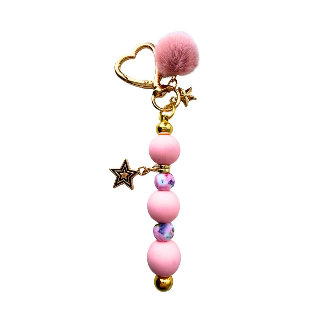 Pink Beaded Star Purse Charm with pink and marbled beads, gold-tone heart clasp, stars and fluffy pom