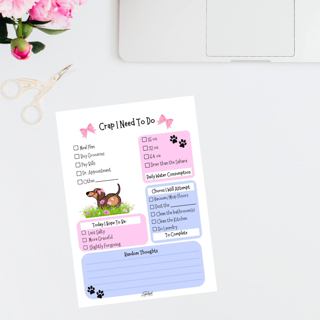 Bean the Weenie Dog Daily Planner 5 x 7 tear-off notepad displayed on a desktop workspace with a clean daily planning layout.
