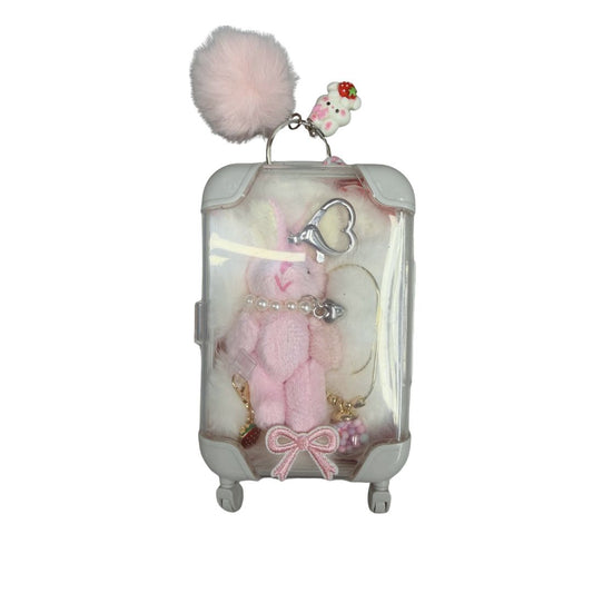 Pink coquette mini suitcase gift set with charms, stickers, scrunchie, and cute accessories