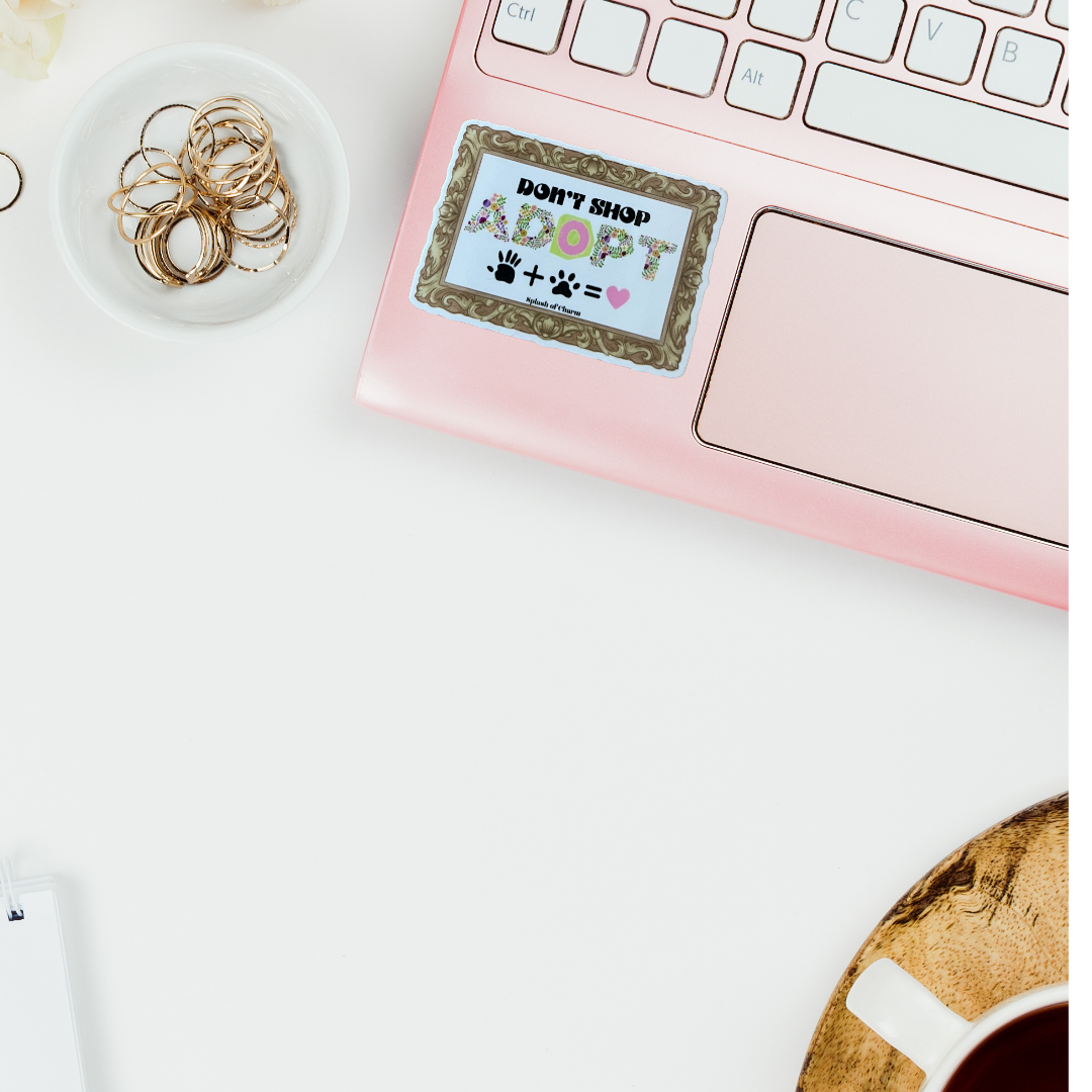 Don’t Shop Adopt vinyl sticker on pink laptop aesthetic setup
