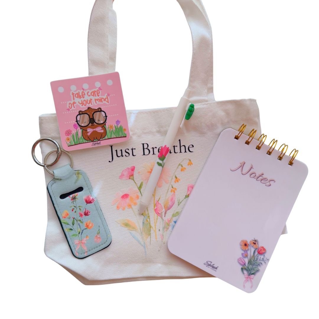 Just Breathe Mini Tote Self-Care Bundle featuring notebook, pen, pouch charm, and coordinated soft pink accessories
