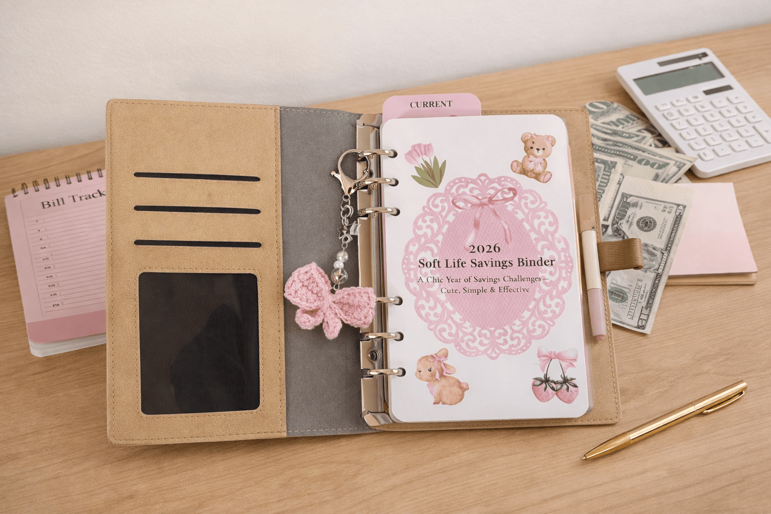 Ku'hai Binder with savings challenges, sinking funds, bow charm, bookmark divider, marker, and gift box packaging.