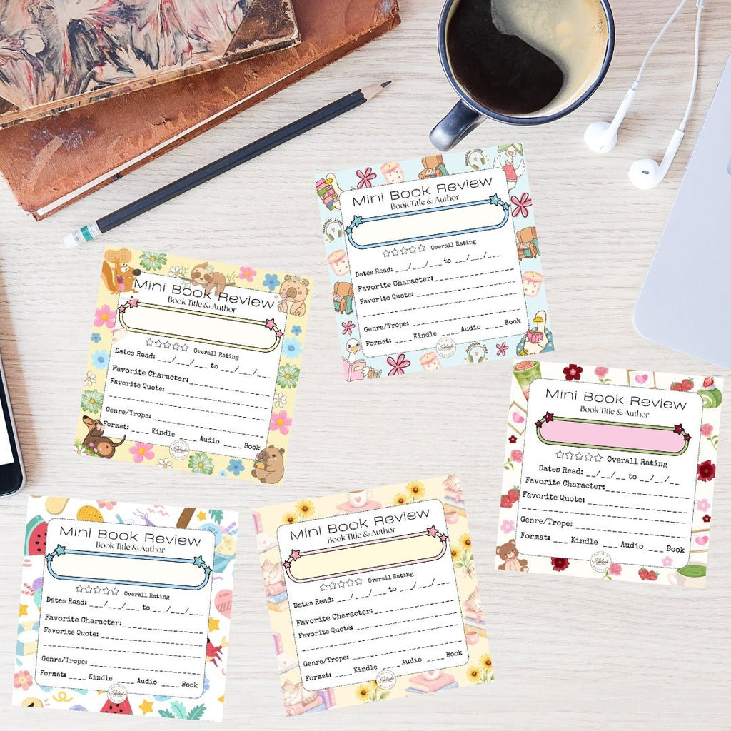 Five colorful 4x4 mini book review tear-off notepads arranged on a desk beside coffee, books, and reading accessories.