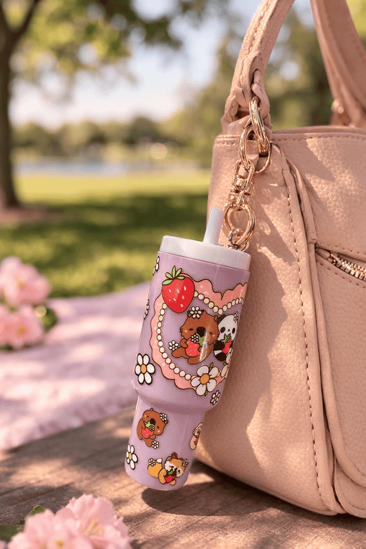 Pink mini stash tumbler charm keychain clipped to purse, cute coquette bag accessory