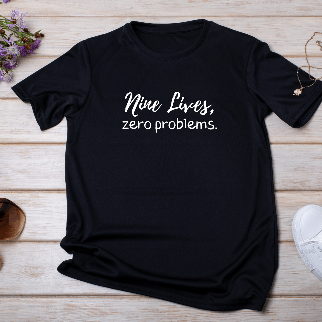 Nine Lives Zero Problems black graphic tee for cat lovers by Splash of Charm