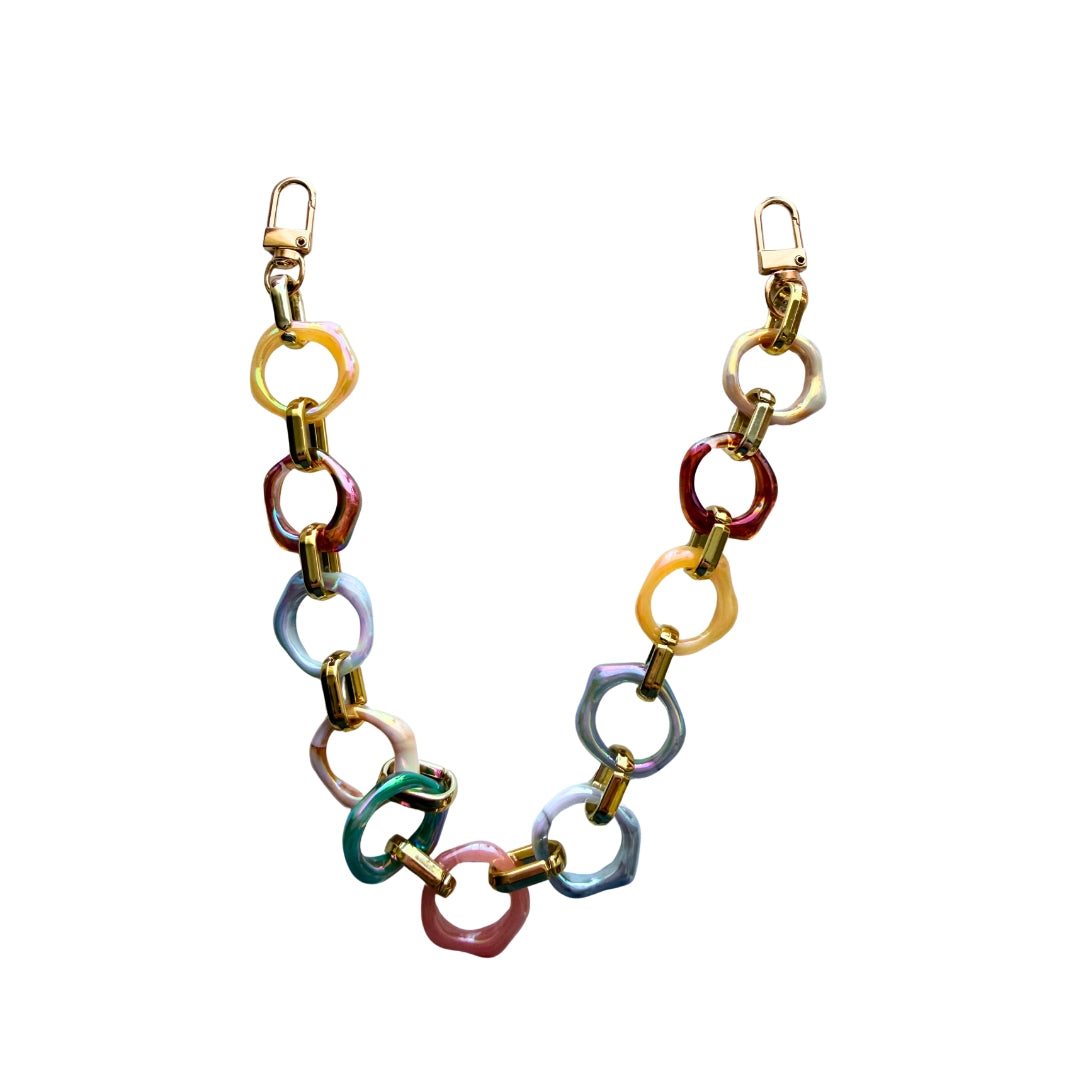 Pastel marbled acrylic purse strap with gold swivel clasps displayed on a white background for handbags, planners, wallets, and compatible accessories.