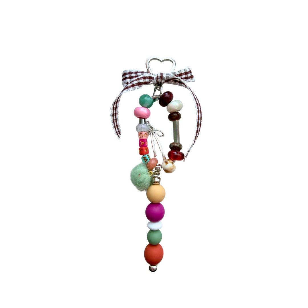 CALM beaded bag charm with brown gingham bow and colorful mixed beads